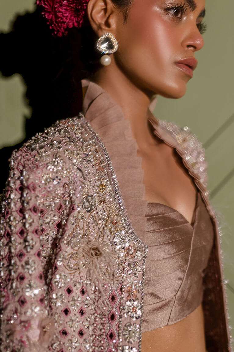 Blush pink jacket with flared pants